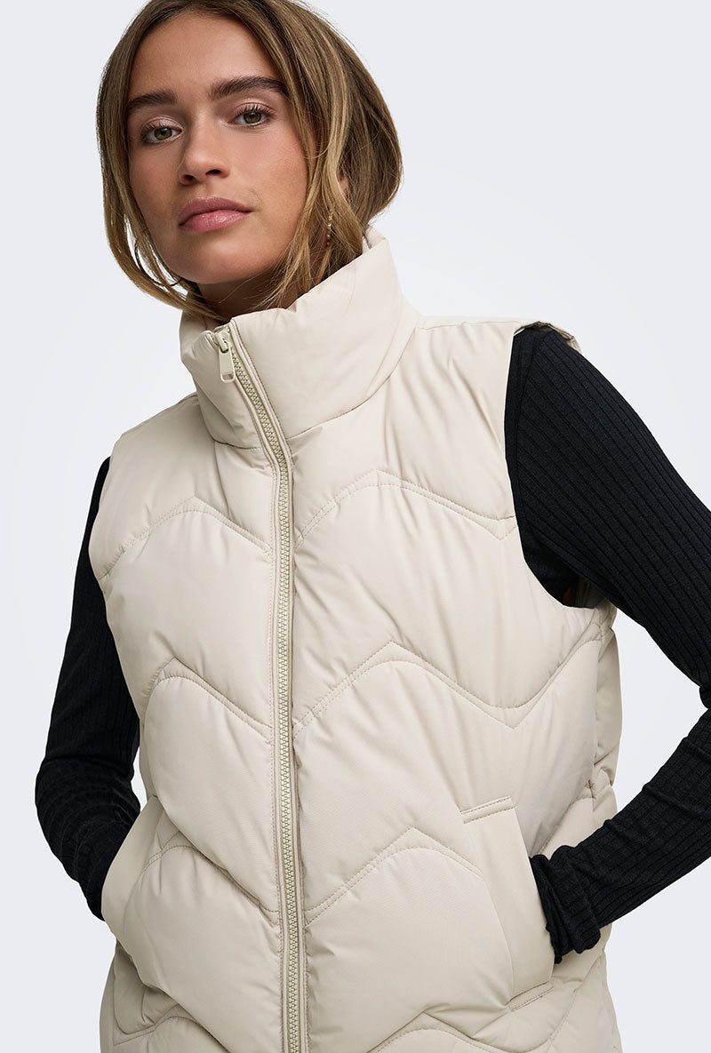 Front image of a model wearing Power short waistcoat in beige, by brand Jacqueline de yong