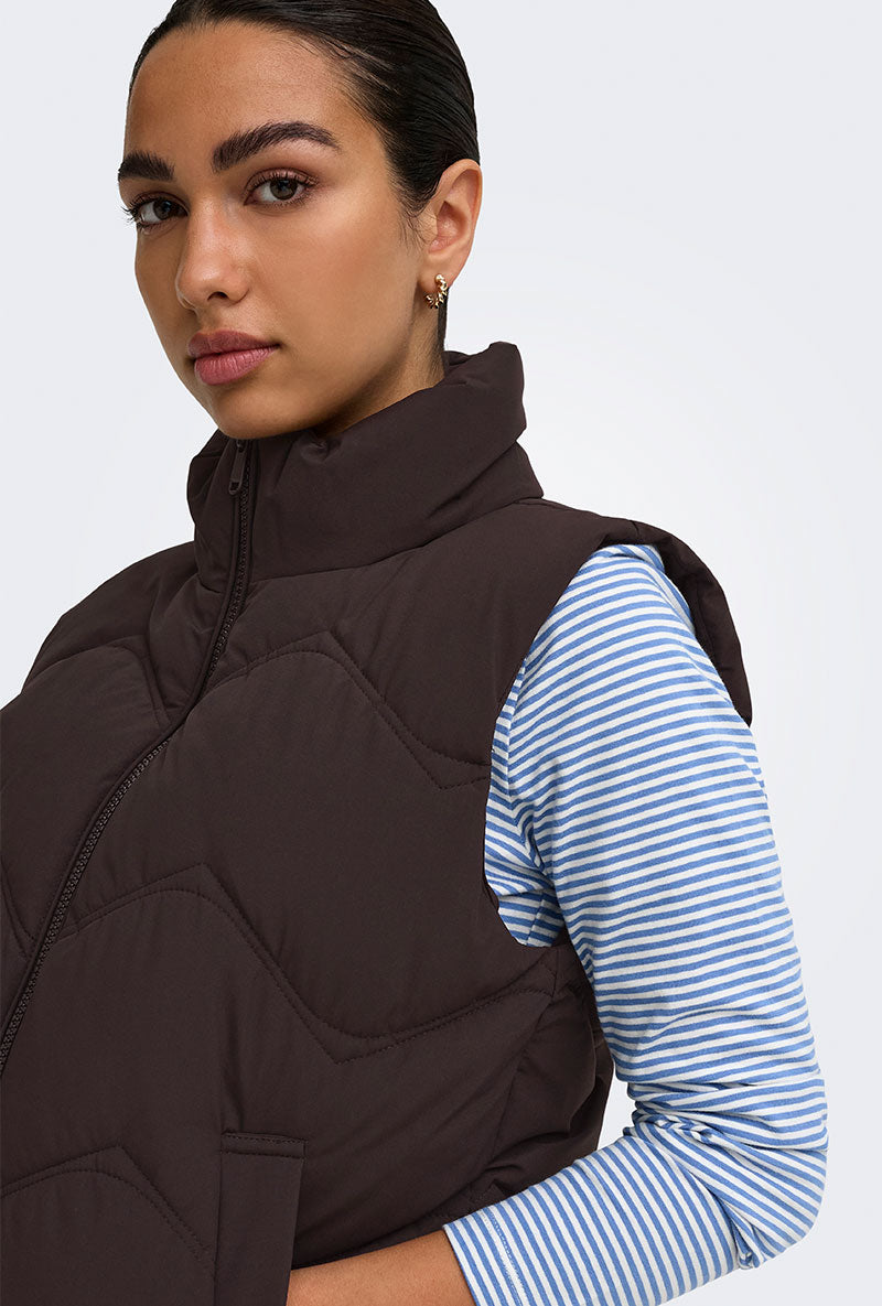 Front image of a model wearing Power short waistcoat in chocolate, by brand Jacqueline de yong