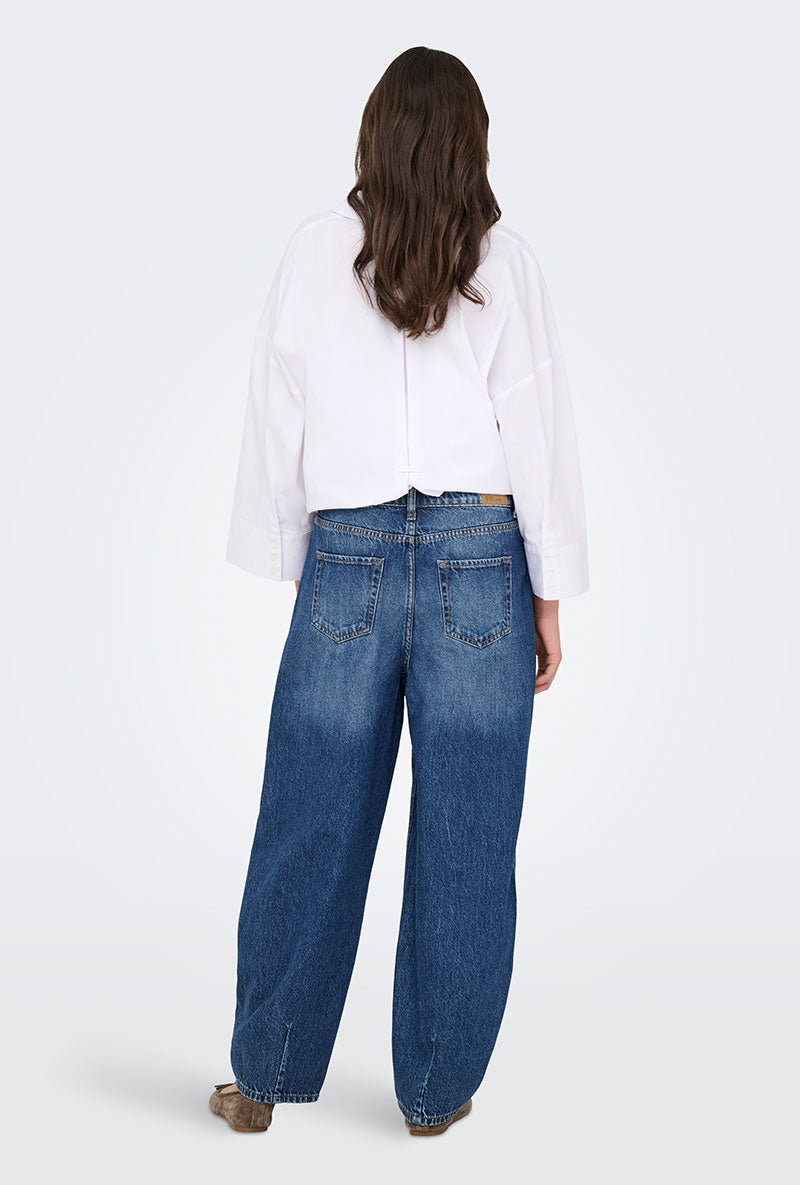 Back image of a model wearing Susie mw barrel jeans in denim, by brand Jacqueline de yong
