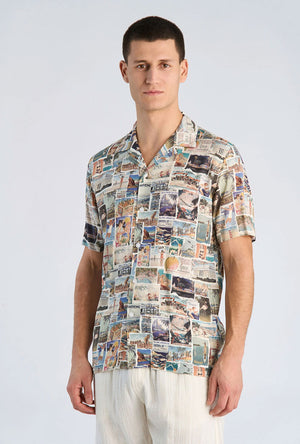 Front image of a model wearing the Aop vintage shirt in all over print, by brand Lindbergh