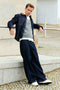 Front image of a model wearing the Corduroy collar overshirt in dark denim, by brand Lindbergh