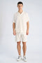 Front image of a model wearing the Cotton muslin resort shirt in off white, by brand Lindbergh