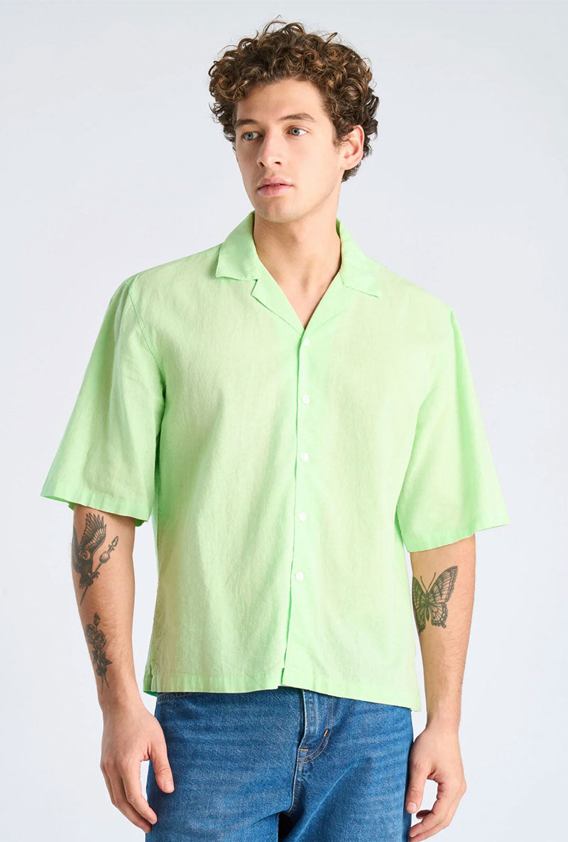 Front image of a model wearing Linen blend cropped shirt in green, by brand Lindbergh