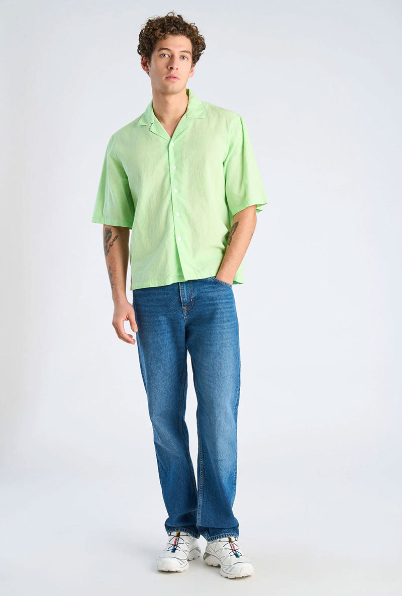 Front image of a model wearing Linen blend cropped shirt in green, by brand Lindbergh