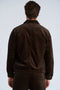 Back image of a model wearing the Seersucker corduroy zip jacket in brown, by brand Lindbergh