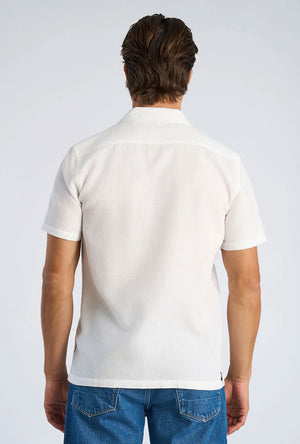 Back image of a model wearing the Solid dobby s/s shirt in white, by brand Lindbergh