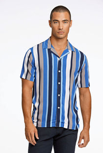 Front image of a model wearing the Bold stripe viscose shirt in blue, by brand Lindbergh