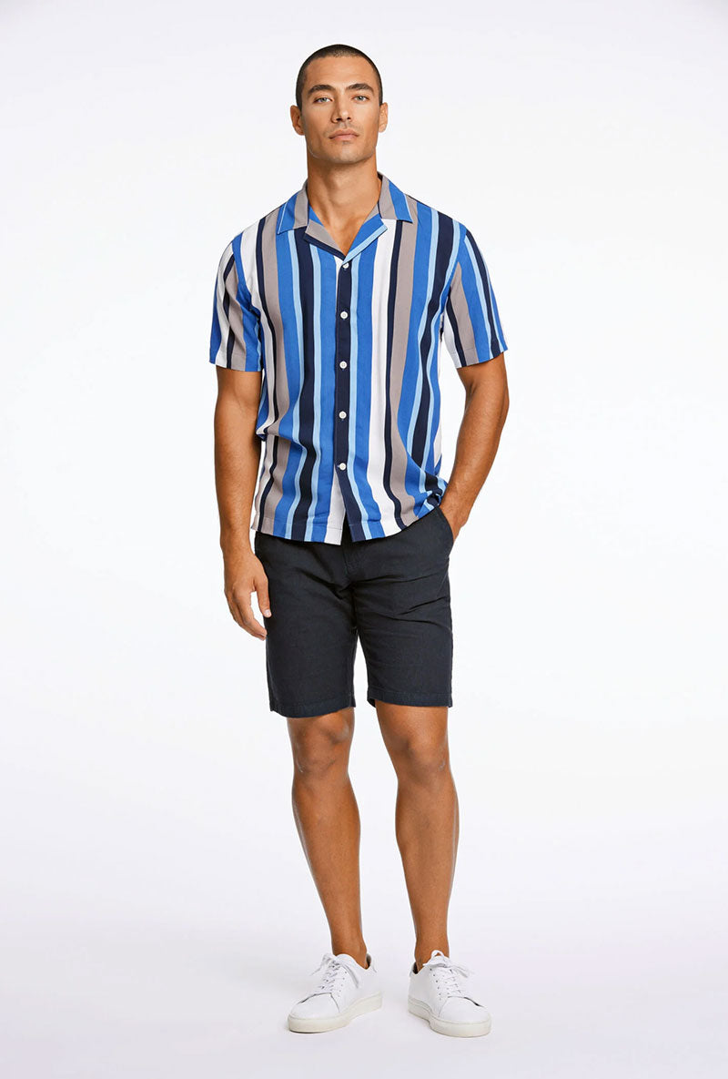 Front image of a model wearing Bold stripe viscose shirt in blue, by brand Lindbergh