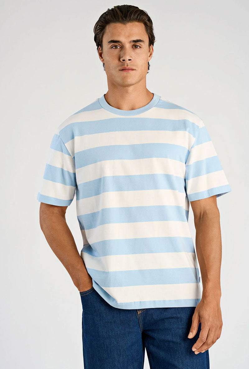 Front image of a model wearing Striped oversized t in blue, by brand Lindbergh