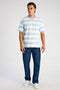 Front image of a model wearing the Striped oversized t in blue, by brand Lindbergh