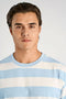 Front image of a model wearing the Striped oversized t in blue, by brand Lindbergh