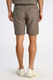 Back image of a model wearing the Textured shorts in khaki, by brand Lindbergh