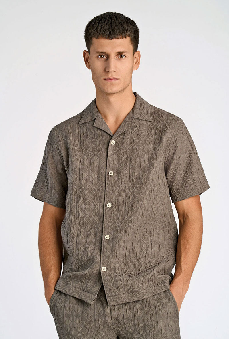 Front image of a model wearing Textured ss shirt in khaki, by brand Lindbergh