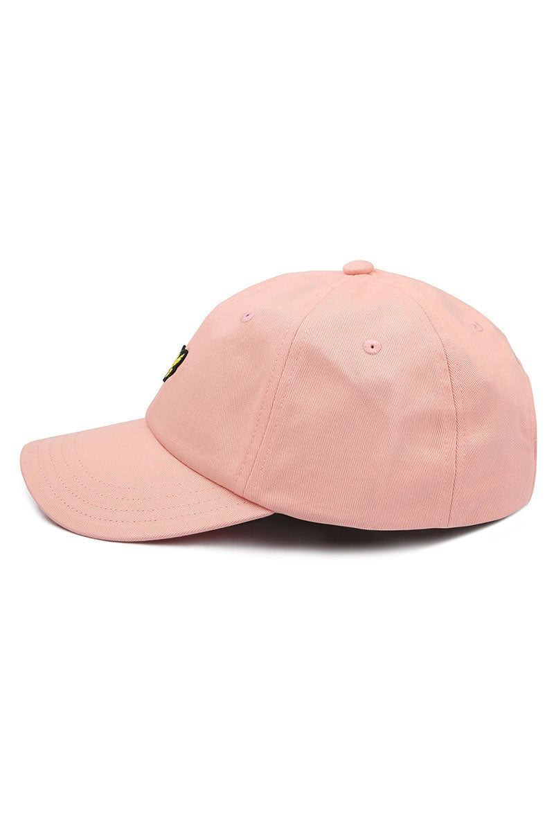 Side image of Baseball cap in peach, by brand Lyle and scott