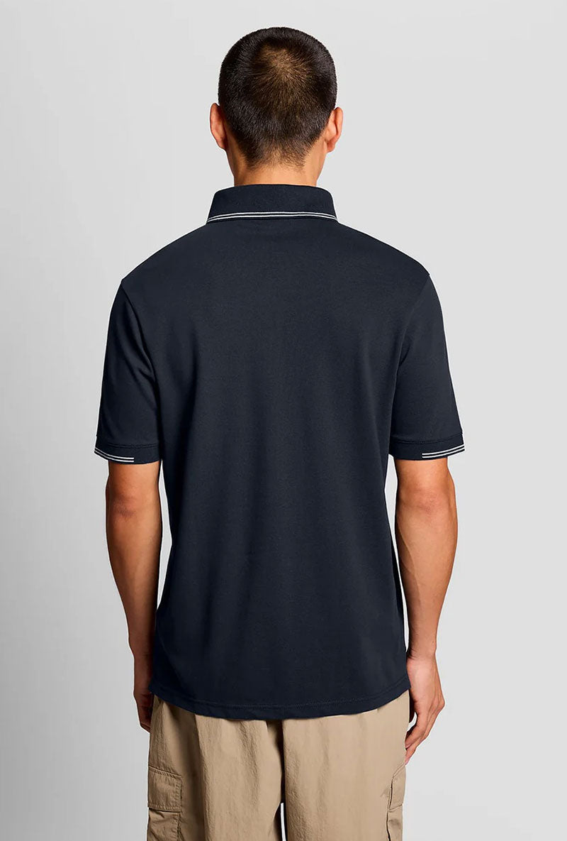 Back image of a model wearing Fine tipped polo in navy, by brand Lyle and scott
