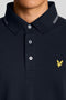 Front neck and button detail image of a model wearing the Fine tipped polo in navy, by brand Lyle and scott