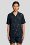 Front image of a model wearing Goldfish resort shirt in navy, by brand Lyle and scott