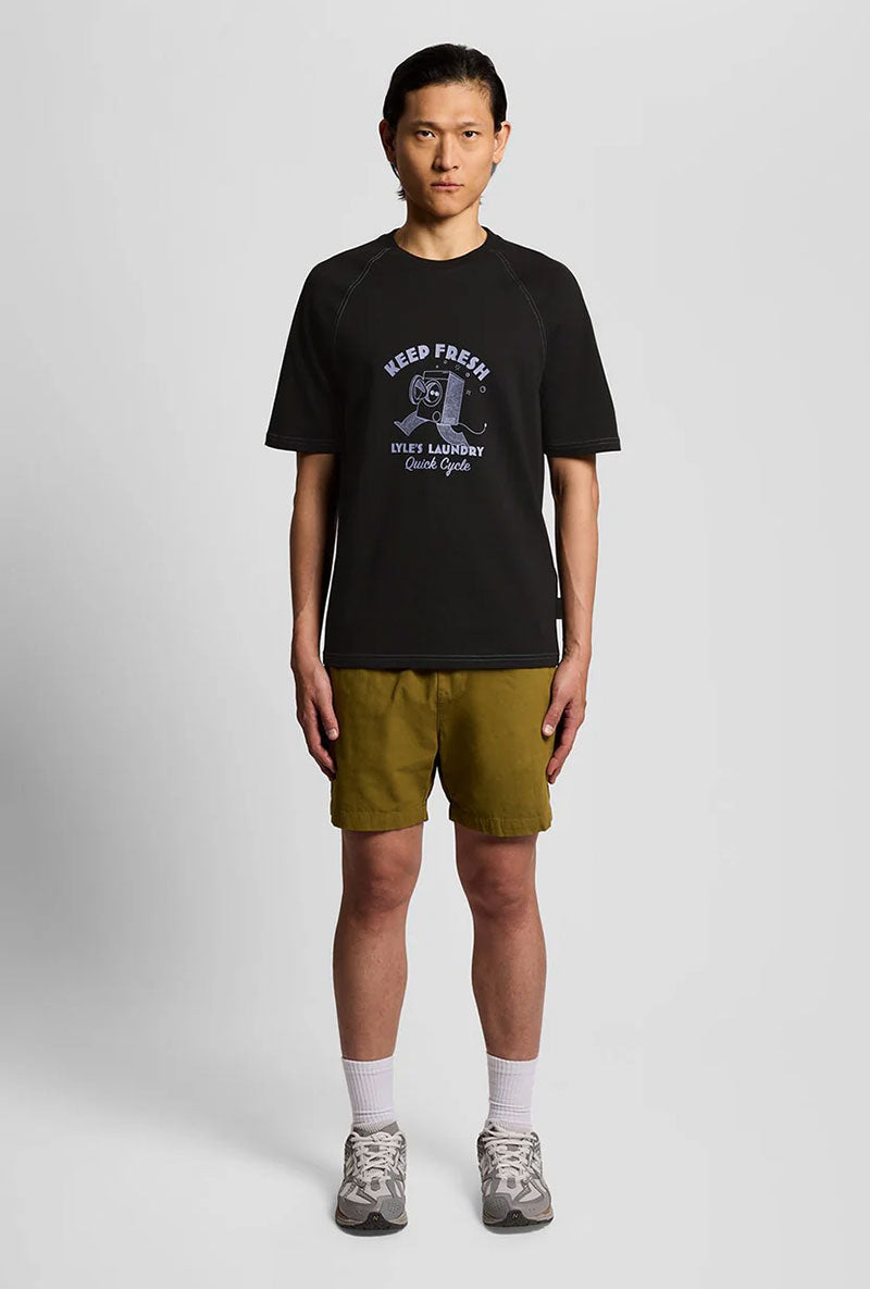Front image of a model wearing Keep fresh graphic t in navy, by brand Lyle and scott