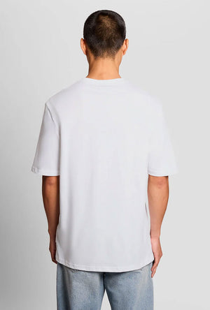 Back image of a model wearing the Lyles laundry graphic t in white, by brand Lyle and scott