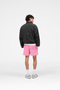Back image of the Micro owners club mesh shorts in pink, by brand Represent