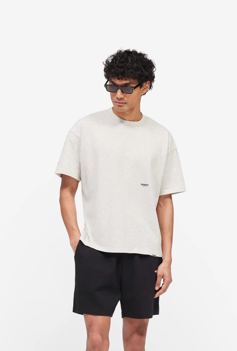 Front image of Micro owners club tshirt in cream, by brand Represent