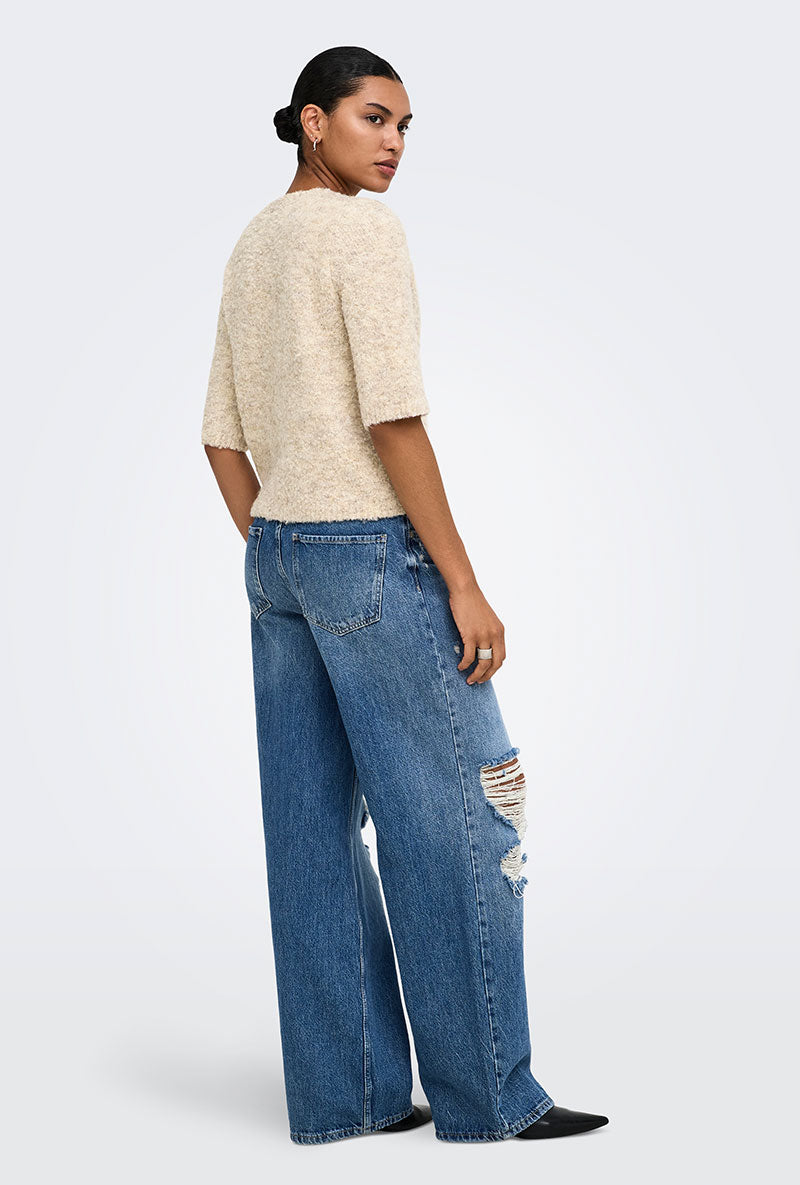 Back image of a model wearing Bouble ss vneck button cardigan in stone, by brand Only