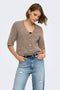 Front image of a model wearing Bouble ss vneck button cardigan in brown, by brand Only