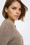 Front image of a model wearing the Bouble ss vneck button cardigan in brown, by brand Only