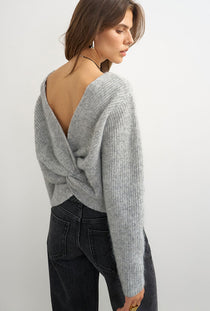 Back image of a model wearing the Cally knitted knot jumper in grey, by brand Top shop