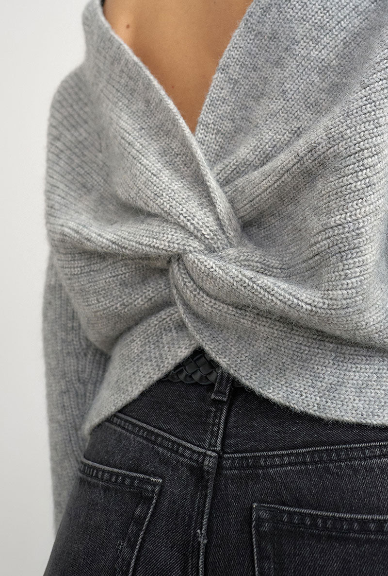 Back image of a model wearing Cally knitted knot jumper in grey, by brand Top shop