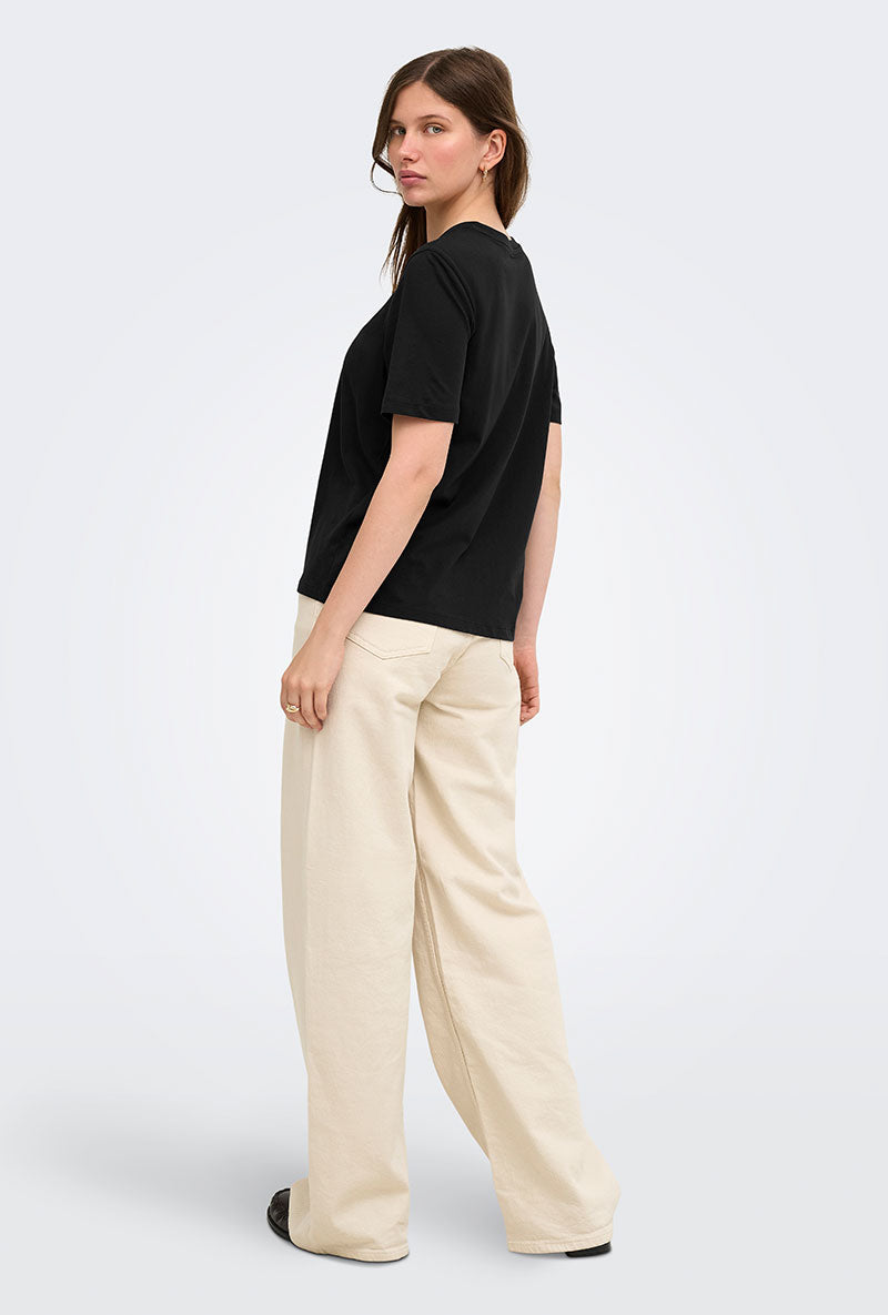 Back image of a model wearing Happy ss oneck tee in black, by brand Only