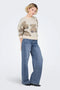 Front image of a model wearing the Hope mw wide jeans in denim, by brand Only