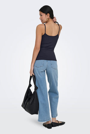 Back image of a model wearing the Lea sl new singlet in navy, by brand Only