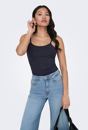 Front image of a model wearing the Lea sl new singlet in navy, by brand Only