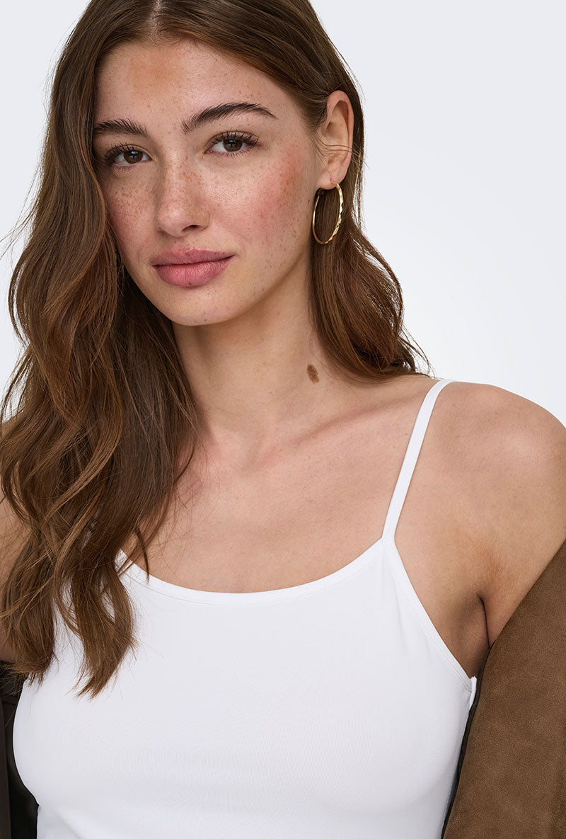 Front image of a model wearing Lea sl new singlet in white, by brand Only