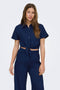 Front image of a model wearing Leoni seersucker cap knot shirt in navy, by brand Only