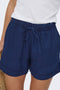 Front image of a model wearing the Leoni seersucker pull up shorts in navy, by brand Only