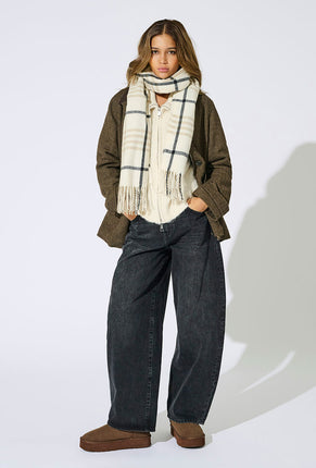 Front image of a model wearing Mathilde check fringe scarf in grey, by brand Only