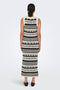 Back image of a model wearing the Only merida life maxi knit dress in ecru, by brand Only