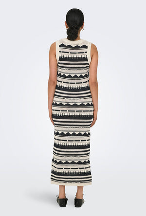 Back image of a model wearing the Only merida life maxi knit dress in ecru, by brand Only