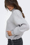 Front image of a model wearing the Nadja ls zip sweat in grey, by brand Only
