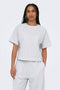 Front image of a model wearing Ofelia ss raglan sweatshirt in light grey, by brand Only