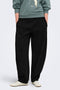Front image of a model wearing Ofelia sweatpants in black, by brand Only