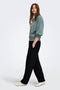 Front image of a model wearing the Ofelia sweatpants in black, by brand Only