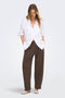 Front image of a model wearing the Ofelia sweatpants in brown, by brand Only