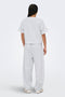Back image of a model wearing the Ofelia sweatpants in light grey, by brand Only
