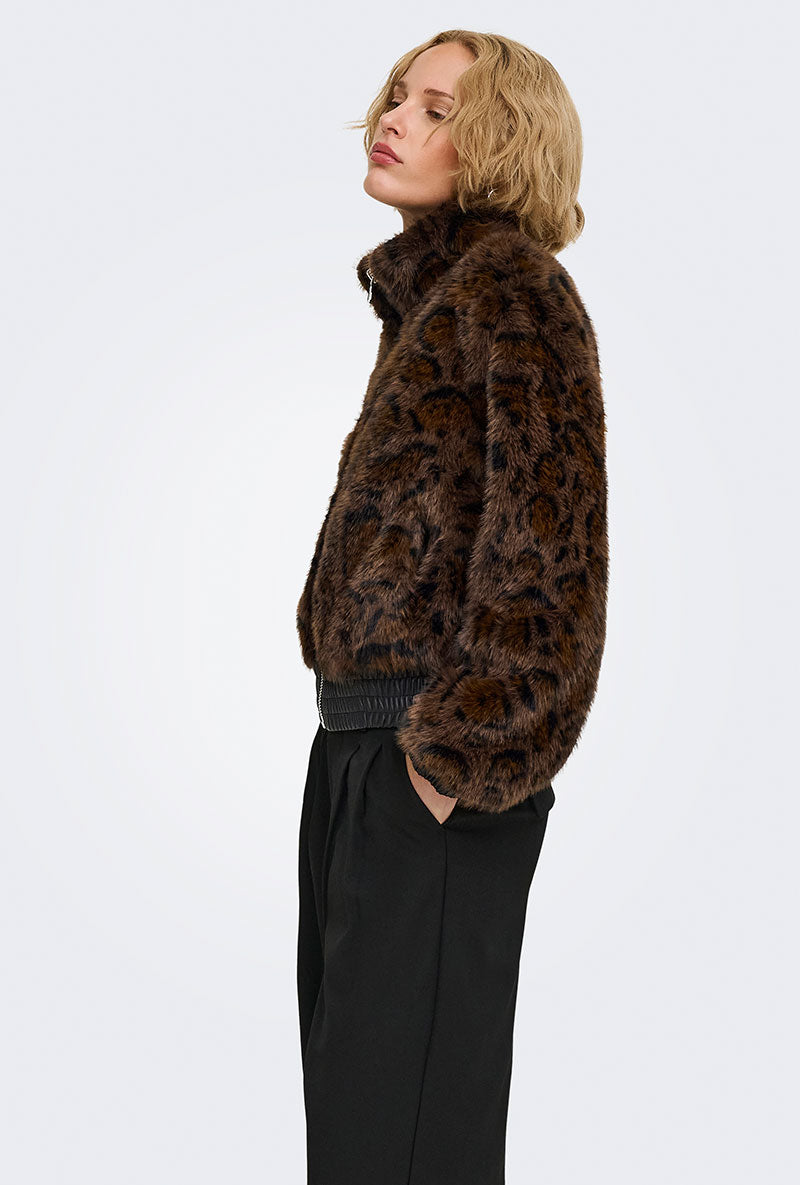 Front image of a model wearing Rikke faux fur jacket in black, by brand Only