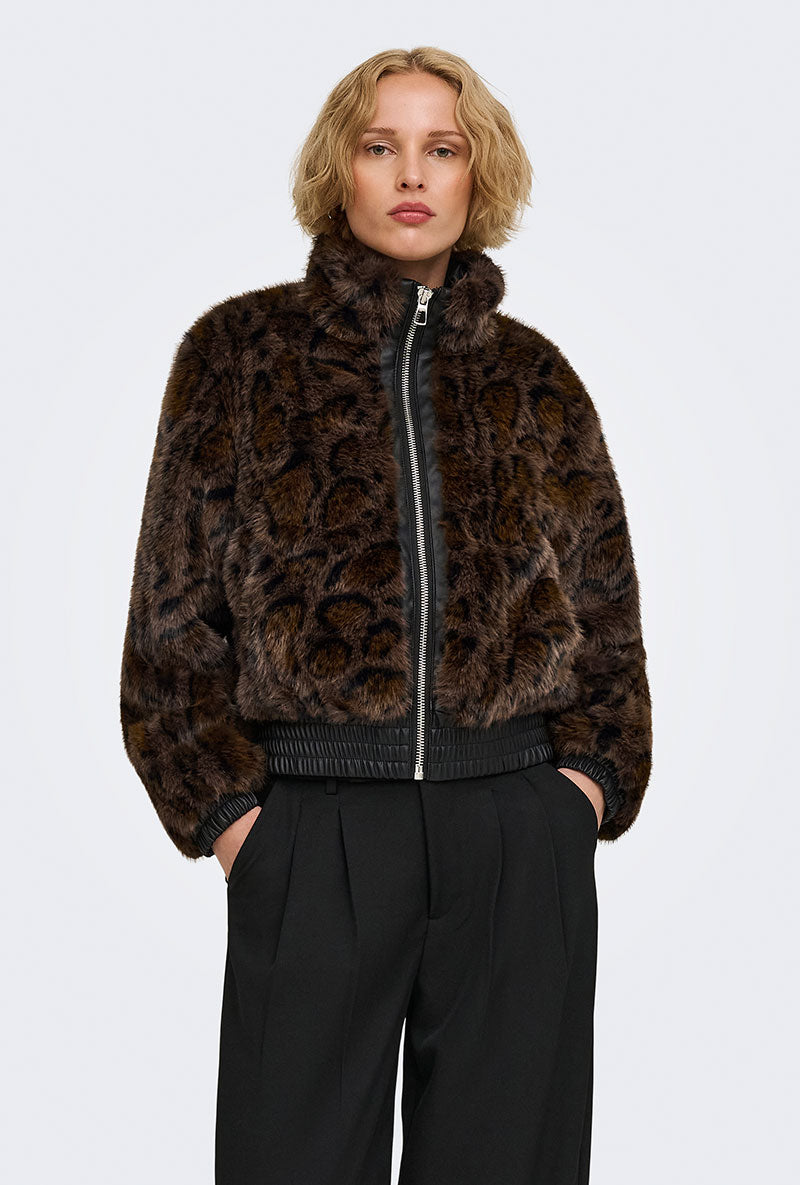 Front image of a model wearing Rikke faux fur jacket in black, by brand Only