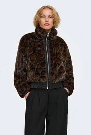 Front image of a model wearing the Rikke faux fur jacket in black, by brand Only