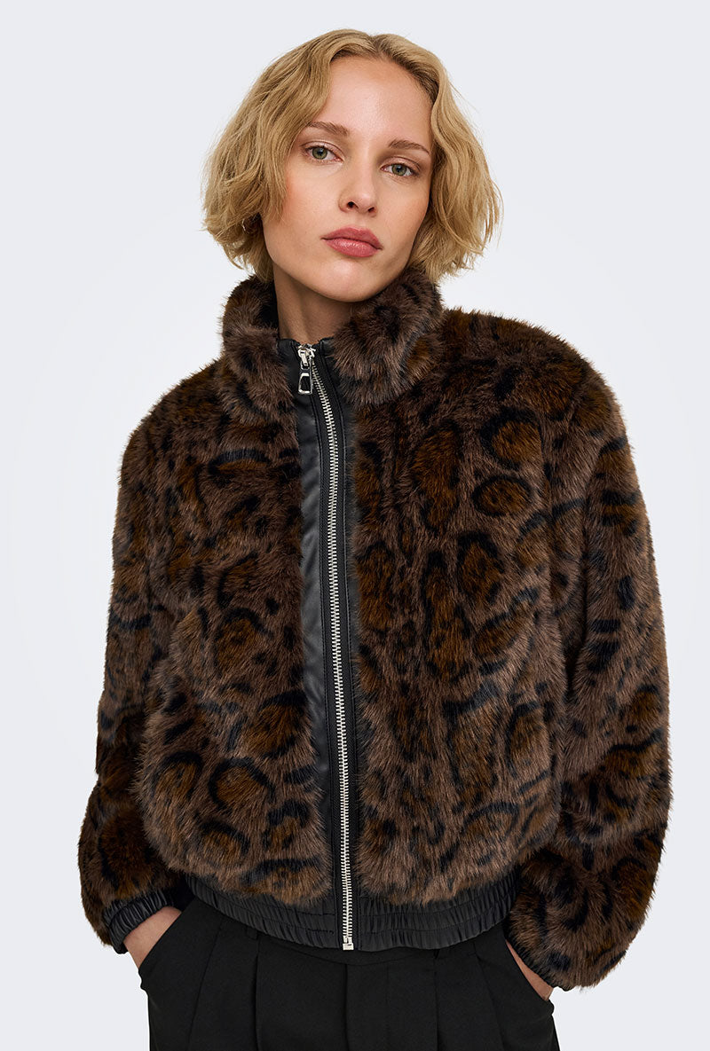 Front image of a model wearing Rikke faux fur jacket in black, by brand Only